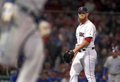 Boston, MA: 5-1-18: Red Sox closer Craig Kimbrel reacts as the Royals Alex Gordon rounds first base following his top of the ninth inning solo home run that tied the game at 3-3. The Boston Red Sox hosted the Kansas City Royals in a regular season MLB baseball game at Fenway Park. (Jim Davis/Globe Staff)

