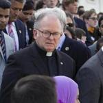 FILE - In this June 13, 2016, file photo Rev. Patrick Conroy, chaplain of the House of Representatives, delivers an interfaith message on the steps of the Capitol in Washington for the victims of the mass shooting at an LGBT nightclub in Orlando. Conroy, a Roman Catholic priest from the Jesuit order, has been forced out after seven years by House Speaker Paul Ryan after complaints by some lawmakers claimed he was too political. (AP Photo/J. Scott Applewhite)