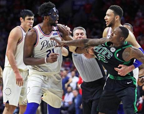 Terry Rozier (right) showed that he wasn?t going to back down to anyone, not even 76ers center Joel Embiid during a second-quarter exchange Monday.
