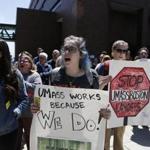 Dorchester, MA--5/8/2018-- Maddi Walker a UMass Boston Sophomore (C) chanted with others during a rally after UMASS Boston students walk out of classes in protest of the Mt. Ida deal. (Jessica Rinaldi/Globe Staff) Topic: 09umassbostonpic Reporter: