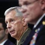 Marine Gen. Thomas D. Waldhauser, commander, center, U.S. Africa Command, with Assistant Secretary of Defense for International Security Affairs Robert S. Karem, left, and Army Maj. Gen. Roger L. Cloutier, right, chief of staff, U.S. Africa Command, and lead investigating officer, brief members of the media at the Pentagon, Thursday, May 10, 2018. The Pentagon said multiple failures are to blame for the Niger ambush that killed four U.S. service members last October, citing insufficient training and preparation as well as the team's deliberate decision to go after a high-level Islamic State group insurgent without proper command approval. (AP Photo/Pablo Martinez Monsivais)