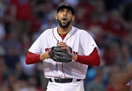 Boston, MA: June 13, 2017: Red Sox starting pitcher David Price reacts after a third inning pitch he threw to the Phillies Daniel Nava that he thought was a strike was called a ball. The Boston Red Sox hosted the Philadelphia Phillies in a regular season MLB inter league baseball game at Fenway Park. (Globe Staff Photo/ Jim Davis) 
