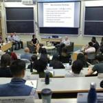 James Sinegal, center right, cofounder and retired CEO of Costco Wholesale, speaks to a class at the MIT Sloan School of Management. At left is Professor Zeynep Ton.