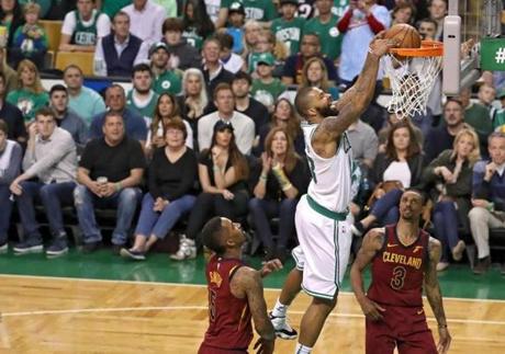 Boston MA 5/13/18 Boston Celtics Marcus Morris slam dunks in between Cleveland Cavaliers J. R. Smith and George Hill during second quarter action of the NBA Eastern Conference finals at TD Garden. (photo by Matthew J. Lee/Globe staff) topic: reporter: 
