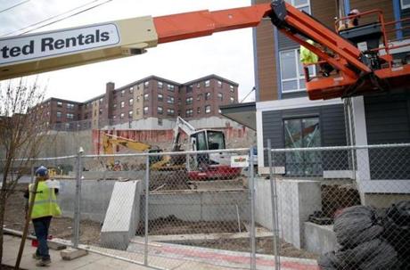 Redevelopment has reached the public housing complex in Orient Heights in East Boston. 

