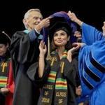Diane Guerrero receives an honorary degree at Regis College.