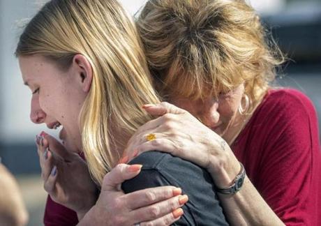 Santa Fe High School student Dakota Shrader was comforted by her mother, Susan Davidson, following the shooting. 
