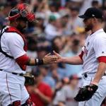 Boston, MA - 4/17/2017 - (9th inning) Boston Red Sox relief pitcher Craig Kimbrel (46)and Boston Red Sox catcher Sandy Leon (3) celebrate the 4-3 win over the Tampa Bay Rays. The Boston Red Sox host the Tampa Bay Rays in the final game of a four game series at Fenway Park. - (Barry Chin/Globe Staff), Section: Sports, Reporter: Peter Abraham, Topic: 18Red Sox-Rays, LOID: 8.3.2221607101.