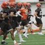Cleveland Browns quarterback Baker Mayfield (6) runs a drill during rookie minicamp at the NFL football team's training camp facility, Friday, May 4, 2018, in Berea, Ohio. (AP Photo/Tony Dejak)