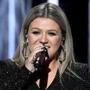Kelly Clarkson spoke onstage Sunday during the Billboard Music Awards in Las Vegas. 