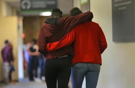 Two girls embraced after a prayer service was held at Grace Church in Avon for the teens involved in a fatal East Bridgewater car crash. 
