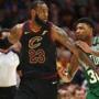 CLEVELAND, OH - MAY 21: LeBron James #23 of the Cleveland Cavaliers handles the ball against Marcus Smart #36 of the Boston Celtics in the fourth quarter during Game Four of the 2018 NBA Eastern Conference Finals at Quicken Loans Arena on May 21, 2018 in Cleveland, Ohio. NOTE TO USER: User expressly acknowledges and agrees that, by downloading and or using this photograph, User is consenting to the terms and conditions of the Getty Images License Agreement. (Photo by Gregory Shamus/Getty Images)