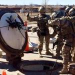 In this February 2016 photo, members of the 790th Missile Security Forces Squadron demonstrate their training for recapturing a Minuteman missile silo after being taken over by an intruder/attacker, just days before the Air Force announced the drug investigation, at the Francis E. Warren Air Force Base, near Cheyenne, Wyo. Then Deputy Secretary of Defense Robert Work, observed the demonstration. Inside an Air Force unit entrusted to protect nuclear missiles, a drug ring operated undetected for nearly a year. Documents obtained by The Associated Press reveal at least six airmen were buying, distributing or using the illegal hallucinogen, LSD. (AP Photo/Robert Burns)