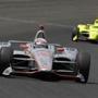 Will Power, of Australia, leads Simon Pagenaud, of France, though the first turn during the Indianapolis 500 auto race at Indianapolis Motor Speedway, in Indianapolis Sunday, May 27, 2018. (AP Photo/AJ Mast)