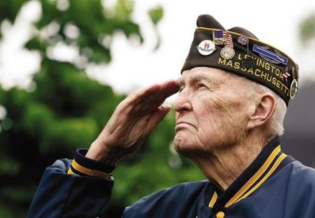 Lexington, MA--5/28/2018-- Korean War Veteran Bob J. Tracey, of Lexington (C) salutes after laying a wreath to honor those who served in the Vietnam War during the Lexington Memorial Day Parade. (Jessica Rinaldi/Globe Staff) Topic: Reporter: 
