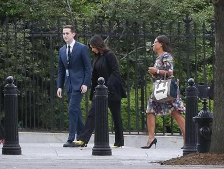 Kim Kardashian, center, arrives at the security entrance of the White House in Washington, Wednesday, May 30, 2018. (AP Photo/Pablo Martinez Monsivais)
