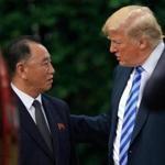 President Donald Trump talks with Kim Yong Chol. 