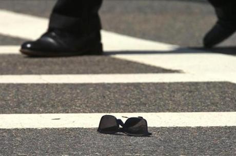 Sunglasses belonging to the 80-year-old man who was struck and killed in a crosswalk in the 1300 block of Commonwealth Avenue on Wednesday. 
