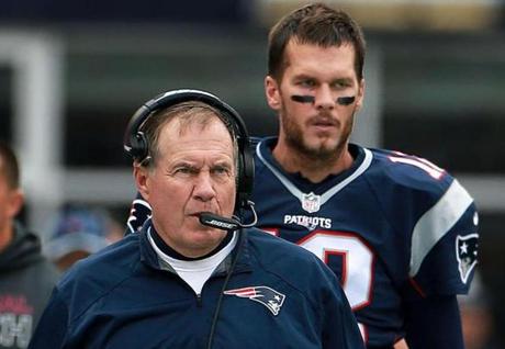 10/25/15: Foxborough, MA: With only three days off betwen games, Patriots quarterback Tom Brady (rear) and head coach Bill Belichick (front) will have very little time to get ready for Thursday night's game vs the Dolphins. They are pictured on the sidelines during Sunday's game vs. the Jets. The New England Patriots hosted the New York Jets in a regular season NFL football game at Gillette Stadium. (Globe Staff Photo/Jim Davis) section:sports topic:Patriots-Jets (1)
