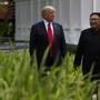 President Donald Trump walked with North Korean leader Kim Jong Un on Sentosa Island on Tuesday.