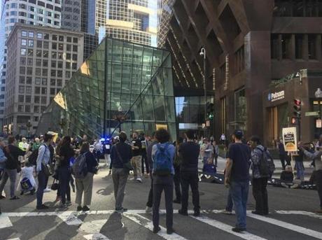 Protesters from the Massachusetts Poor People's Campaign marched from the State House to Post Office Square, where they shut down traffic in the heart of the financial district.
