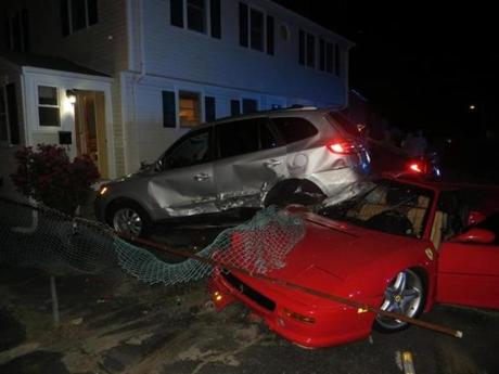 A 50-year-old man crashed his brother's Ferrari into this parked vehicle Tuesday night. 
