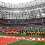 MOSCOW, RUSSIA - JUNE 14: Russia and Saudi Arabia line up prior to the 2018 FIFA World Cup Russia Group A match between Russia and Saudi Arabia at Luzhniki Stadium on June 14, 2018 in Moscow, Russia. (Photo by Catherine Ivill/Getty Images)