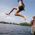An eager swimmer leaped into the water during the sanctioned swim in the Charles hosted by the Charles River Conservancy in 2017. On Thursday, the organization announced that it won?t host the swim this summer.