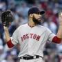 Boston Red Sox starting pitcher David Price calls for a new ball after giving up two hits to the Seattle Mariners during the fifth inning of a baseball game Thursday, June 14, 2018, in Seattle. (AP Photo/Elaine Thompson)