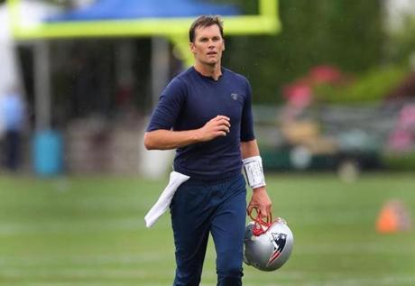 Foxborough- 06/05/18- QB Tom Brady runs off the field after practice. The Patriots held a minicamp at the Gillette Stadium practice facility. Photo by John Tlumacki/Globe Staff(sports)
