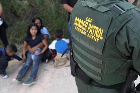 Central American asylum seekers waited last week in McAllen, Texas, as US Border Patrol agents took them into custody.
