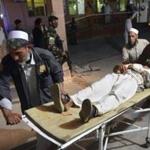 A wounded man was brought into a hospital in the Afghan city of Jalalabad after a bombing at an Eid al-Fitr celebration.
