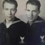 In this undated photo, provided by family member Susan Lawrence on Wednesday, June 13, 2018, twin brothers Julius Pieper, left, and Ludwig Pieper in their U.S. Navy uniforms. For decades, he had a number for a name, Unknown X-9352, at a World War II American cemetery in Belgium where he was interred. On Tuesday, June 19, 2018, Julius Pieper will be reunited with his twin brother in Normandy, where the two Navy men died together when their ship shattered on an underwater mine while trying to reach the blood-soaked D-Day beaches. (Susan Lawrence via AP)