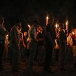 White supremacist groups marched with torches through the UVA campus in Charlottesville, Va. last year. 