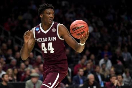 LOS ANGELES, CA - MARCH 22: Robert Williams #44 of the Texas A&M Aggies with the ball in the first half against the Michigan Wolverines in the 2018 NCAA Men's Basketball Tournament West Regional at Staples Center on March 22, 2018 in Los Angeles, California. (Photo by Harry How/Getty Images)
