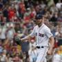 Boston, MA--6/24/2018-- Red Sox starting pitcher Chris Sale reacts after striking out Mariners Mike Zunino during the seventh inning at Fenway Park. (Jessica Rinaldi/Globe Staff) Topic: Reporter: 