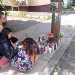 Mourners gathered at a sidewalk memorial, on Lawton Avenue in Lynn, for 25-year-old Romel Danis, who shot early Saturday.