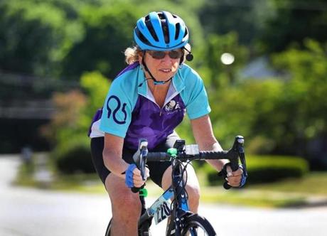 Ann Whaley-Tobin, 68, headed out for a bike ride. She also does yoga and seeks mental stimulation.
