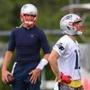 Foxborough- 06/05/18- Tom Brady(left) and Julian Edelman stayed after practice for about twenty minutes as Brady threw some passes to him. The Patriots held a minicamp at the Gillette Stadium practice facility. Photo by John Tlumacki/Globe Staff(sports)