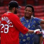Pedro Martinez (right) spent time chatting with J.D. Martinez before a recent game at Fenway Park.