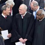Justice Anthony Kennedy (center).