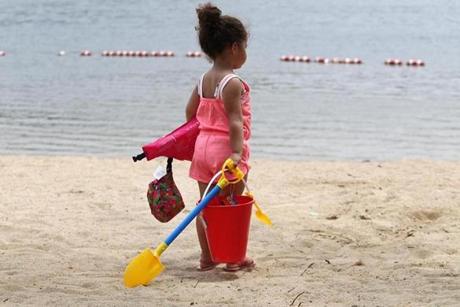 At Cochituate State Park, three-year-old Laylani Delarosa is ready for a day at the beach. 
