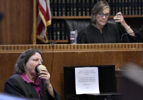 BOSTON - 6/29/2018 -- Court reporter Nancy King takes her final courtroom transcript, in a plea change proceeding before judge Janet Sanders, in Suffolk Superior Court. On June 30, the state will begin to rely primarily on digital transcription equipment, including the computer on the desk beside King. Josh Reynolds for The Boston Globe (Metro, crimaldi) 

