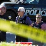 Police officers secured the area after multiple people were shot at an office building housing The Capital Gazette newspaper in Annapolis, Md., Thursday.