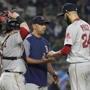 Boston Red Sox starting pitcher David Price (24) hands the ball to manager Alex Cora as he leaves during the fourth inning of a baseball game against the New York Yankees, Sunday, July 1, 2018, in New York. (AP Photo/Frank Franklin II)