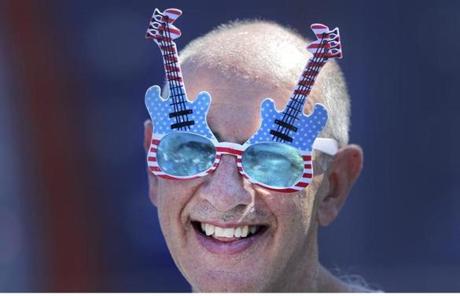 SLIDER - JULY FOURTH -Boston, MA - 07/04/18 - Doc Rutstein (cq) of Braintree gets ready for his 24th year in a row on the Esplanade before the July 4 Boston Pops concert. (Lane Turner/Globe Staff) Reporter: () Topic: (05esplanade)
