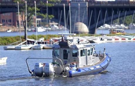 SLIDER - JULY FOURTH -Boston, MA - 07/04/18 - A State Police boat patrolled on the Esplanade before the July 4 Boston Pops concert. (Lane Turner/Globe Staff) Reporter: () Topic: (05esplanade)
