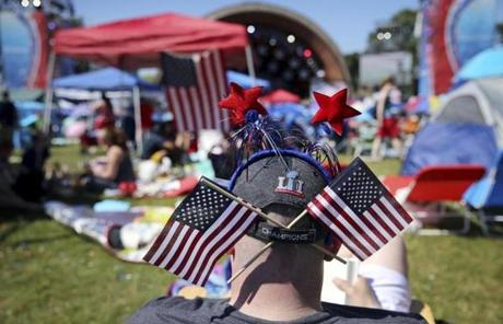 SLIDER-- Ben Woupio of Northbridge, MA, was decorated for the occasion while waiting for the Boston Pops Fireworks Spectacular to begin at the Hatch Shell on the Esplanade in Boston, MA on July 04, 2018. (Craig F. Walker/Globe Staff) section: metro reporter:
