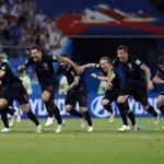 Croatia national soccer team players celebrate after winning the quarterfinal match between Russia and Croatia at the 2018 soccer World Cup in the Fisht Stadium, in Sochi, Russia, Saturday, July 7, 2018. (AP Photo/Manu Fernandez)