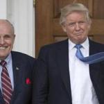 (FILES) In this file photo taken on November 20, 2016 President-elect Donald Trump meets with former New York City Mayor Rudy Giuliani at the clubhouse of the Trump National Golf Club in Bedminster, New Jersey. A lawyer for US President Donald Trump on July 8, 2018 sharpened his attacks on the special counsel inquiry into possible Trump campaign collusion with Russia, calling it 